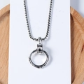 Vintage style long box chain necklace featuring an embossed ring pendant in antique silver finish - Silver