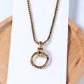Vintage gold circle pendant necklace with engraved texture on a classic box chain - Gold