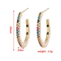 Detail view of 18mm golden C-shaped hoop earrings with colorful rainbow pave gemstones - C-Shaped Open Hoop Style (WEH962) / KC Gold Multicolor