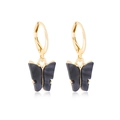 Elegant gold butterfly hoop earrings with black marble resin pendants on white background - Black (WEH1264)