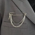 Silver punk safety pin brooch with hanging chains on a grey suit lapel for men and women - Silver