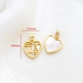 Macro shot of 14k gold-plated heart pendant with natural mother of pearl and Fu character - 1# 18K Gold Heart Fu Character