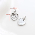 Macro detail of heart-shaped 14k gold-filled shell pendant with 福 character, 13mm by 19mm - 2# White Gold Heart Fu Character