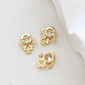 Detailed view of 14k gold-plated girl pendants with cubic zirconia for DIY jewelry - Gold