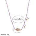 Collana di perle viola con perle d'acqua dolce barocche e ciondoli a stella e luna - Collana di Perle Viola