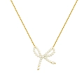 Elegant 18k gold plated butterfly necklace with white pearls on a white background - Pearl Bow Necklace