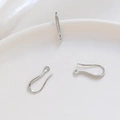 Detailed macro view of three silver-plated U-shaped earring hooks with textured beads - #6 Ear Hooks - Platinum Color