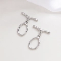 Close-up of polished silver-tone OT toggle clasps for DIY jewelry making and necklaces - 9# White Gold Irregular OT Clasp