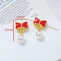 Dettaglio di ciondoli con fiocco rosso e perla da 23mm con misure per gioielli DIY - Fiocco Rosso Perla Artificiale (Prezzo Singolo 7#)