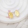 Close-up of gold oval pendant with floral relief and small zircon for jewelry making - Floral Stone Oval Style (6# Single Price)