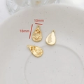 Detail view of 18x10mm gold lotus embossed water drop charm with a glossy back finish - 3# Lotus Relief Teardrop Style (Gold)