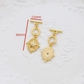 Detail von sternförmigen vergoldeten Schmuckverbindern mit Zirkonia und Maßangaben - Goldenes Sternmodell (3#)