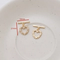 Detailed view of heart-shaped gold-plated OT toggle clasps with cubic zirconia inlay - Dangle Heart Style / Gold