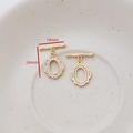 Close-up of 14K gold plated OT toggle clasp with cubic zirconia for DIY jewelry making - Oval Lace Style