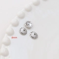 Dettaglio copriperla a fiore traforato da 8mm argento per creazione gioielli fai da te - Placcato Oro Bianco Stile 21
