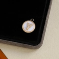Gold plated round pendant featuring white mother of pearl and zircon letter Y detail - Letter Y