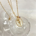 Vintage ovale schelp hanger ketting met gouden 3D bloem en paarse edelsteen - Februari-Iris