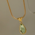 Vintage 18K gold-plated snake chain necklace with a green pear-shaped gemstone drop - Gold