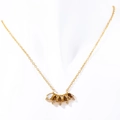 Gold-plated necklace with a fan-shaped pendant of pear-cut brown and white zircons - June