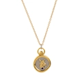 Two-tone 18K gold plated Taurus zodiac seal necklace with a small blue gemstone charm - Taurus