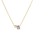 Detail view of gold teardrop necklace with lavender zircon and white pearl pendant - June