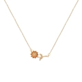 Gold-plated birth flower pendant necklace with intricate petals and a yellow crystal stone - November