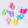 Close-up of colorful music note stitch markers on a metal knitting needle for DIY - Musical Note (23*23mm)