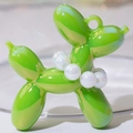 Vibrant green resin balloon dog pendant with a miniature iridescent white pearl necklace - Iridescent Grass Green