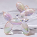 Iridescent balloon dog charm with shiny UV coating and decorative beaded collar detail - With Pearl / Transparent Light Orange (Transparent Bead)