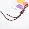 Handmade dark brown woven lanyard with white dots and a functional looped knot - Brown