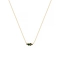 Detail of 18k gold plated necklace with clustered green emerald and black gemstones - May