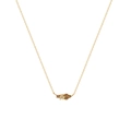 Detail of gold chain necklace featuring yellow and coffee gemstones in a vintage cluster - November