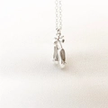 Silver ballet slipper pendant necklace with delicate bow details for women - Steel