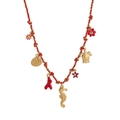 Detailed close-up of woven rope necklace with starfish, turtle, and coral sea-themed pendants - Red Rope Seahorse Necklace