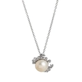 Macro shot of silver crab pendant featuring a large white pearl and zircon accents - Silver Crab