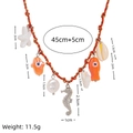 Orange woven ocean necklace with colorful starfish, shell, and seahorse charms - Red Seahorse Necklace