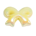 Iridescent light yellow acrylic bow bead with shimmering finish for DIY jewelry - Pearlescent / Yellow