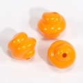 Glossy orange spiral resin beads for DIY jewelry making with central drill holes - Spiral Swirl Bead / Lacquered Light Orange