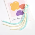Two-tone woven lanyard in cream yellow and mint green with a spiral knot design - Cream and Emerald