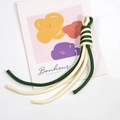 Handcrafted dual-color spiral knot wrist strap lanyard in dark green and cream woven cord - Off-white + Dark Green