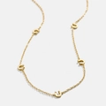 Collier minimaliste en acier titane doré avec cinq breloques fer à cheval polies - Fer à Cheval