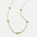 Minimalist gold titanium steel necklace featuring five small cross charms in a row - Cross