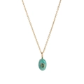 Macro detail of oval turquoise pendant with green gemstone on a thin gold necklace chain - Oval / Blue