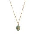 Macro detail of 18k gold plated chain with green stone teardrop pendant and amber center - Oval / Green