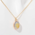Gold oval pendant necklace with white stone and golden leaf pattern for women - Branch (BRANCH)