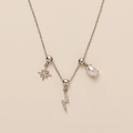 Silver necklace with star, pavé lightning bolt, and pearl pendants on beige background - Lightning Star - Silver