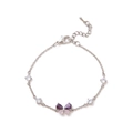 Detail of silver chain bracelet featuring a purple zircon butterfly and clear gemstones - Silver Colorful Butterfly Bracelet