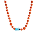 Detailed macro view of beaded necklace featuring a blue fish pendant and colored beads - Fish
