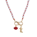 Collana di perle rosse e bianche con ciondoli dorati a forma di labbra e stivali - Collana Labbra Stivale
