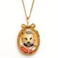 Vintage gold necklace featuring a royal tiger portrait pendant with a bow detail - Gold Tiger Necklace